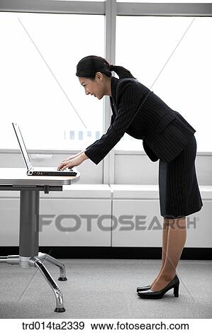 Stock Photo - person, oriental, Korean, Asian, woman, indoor, daytime. Fotosearch