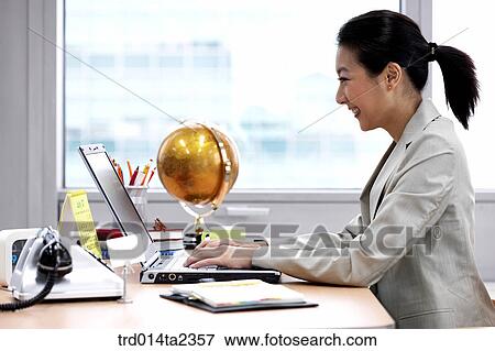 Stock Photo - person, oriental, Korean, Asian, woman, indoor, daytime. Fotosearch