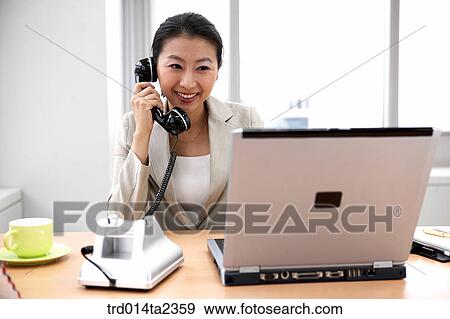 Stock Photo - person, oriental, Korean, Asian, woman, indoor, daytime. Fotosearch