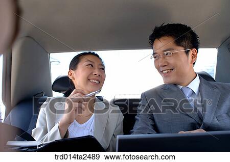 Stock Photo - conversation, associate, person, oriental, Korean, Asian. Fotosearch