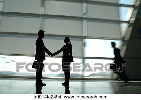 Picture - corridor, handshake, associate, person, oriental, Korean, Asian. Fotosearch