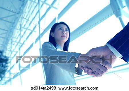 corridor, handshake, associate, corridor, tradeperson, oriental, Korean View Large Photo Image Stock Photo - corridor, handshake, associate, corridor, tradeperson, oriental, Korean. Fotosearch