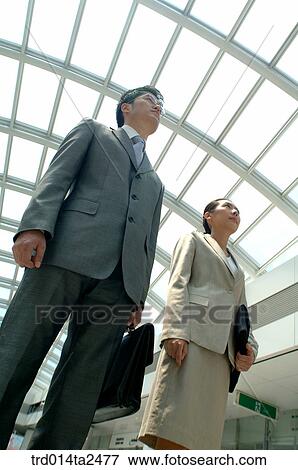 Stock Photo - corridor, person, oriental, Korean, Asian, woman. Fotosearch