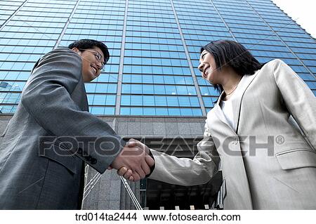 handshake, trade, associate, person, oriental, Korean, Asian View Large Photo Image Picture - handshake, trade, associate, person, oriental, Korean, Asian. Fotosearch