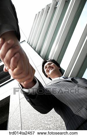 handshake, trade, associate, person, oriental, Korean, Asian View Large Photo Image Stock Photo - handshake, trade, associate, person, oriental, Korean, Asian. Fotosearch