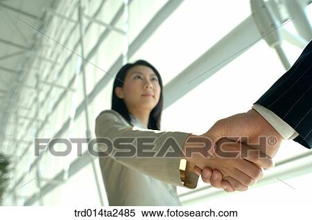 handshake, trade, associate, person, oriental, Korean, Asian View Large Photo Image Stock Photography - handshake, trade, associate, person, oriental, Korean, Asian. Fotosearch