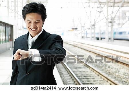 trainstation, business trip, person, oriental, Korean, Asian View Large Photo Image Picture - trainstation, business trip, person, oriental, Korean, Asian. Fotosearch