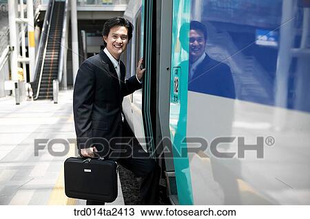 trainstation, business trip, person, oriental, Korean, Asian View Large Photo Image Stock Image - trainstation, business trip, person, oriental, Korean, Asian. Fotosearch