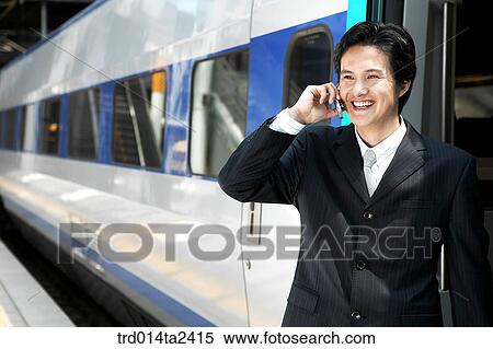trainstation, business trip, conversation, person, oriental, Korean, Asian View Large Photo Image Stock Photography - trainstation, business trip, conversation, person, oriental, Korean, Asian. Fotosearch