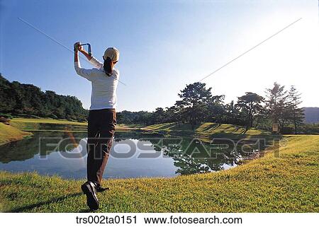 Stock Image - person, Oriental, Korean, one person, woman, outdoor, daylight. Fotosearch
