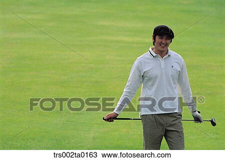 Stock Image - person, Oriental, Korean, one person, outdoor, daylight. Fotosearch