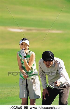 Stock Photograph - person, Oriental, Korean, two people, woman, outdoor. Fotosearch