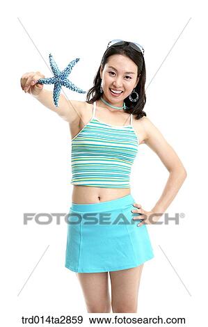 Stock Photo - person, Oriental, Korean, one person, woman, summer, vacation. Fotosearch