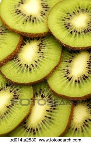 Stock Image - food, fruit, kiwi, background, close up, cut in half. Fotosearch