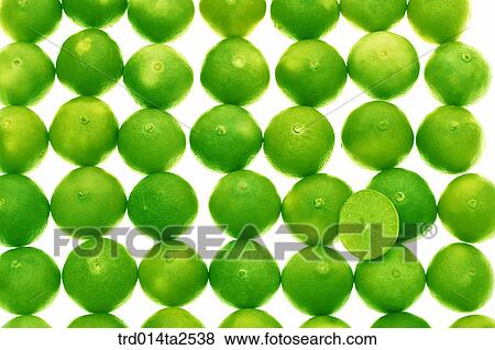 Stock Photo - food, fruit, lime, background, arrangement, close up, cut in half. Fotosearch