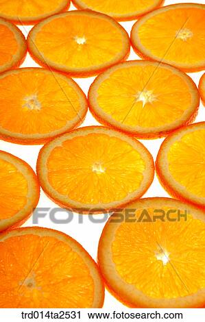 Stock Image - food, fruit, orange, background, close up, cut in half. Fotosearch