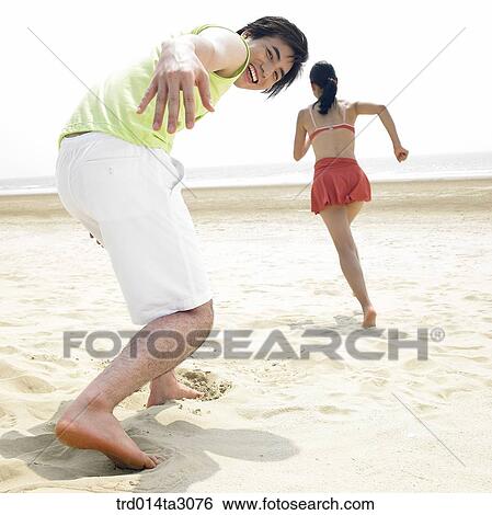 Stock Photograph - figure from behind, running, gesture, action, posture, person, Korean. Fotosearch