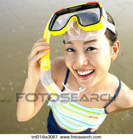 Stock Photo - swimming goggles, gesture, action, posture, person, Korean, summering. Fotosearch
