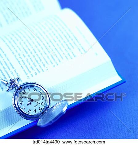 Stock Image - a book and a clock. Fotosearch