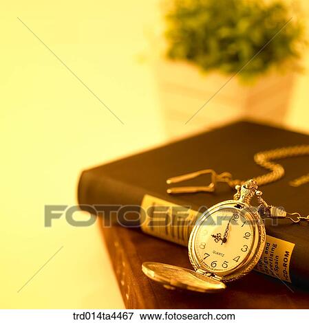 a book and a clock View Large Photo Image Stock Photo - a book and a clock. Fotosearch
