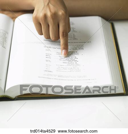 A hand pointing at something View Large Photo Image Stock Photo - A hand pointing at something. Fotosearch