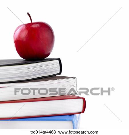 Stock Image - apples on the notebook. Fotosearch