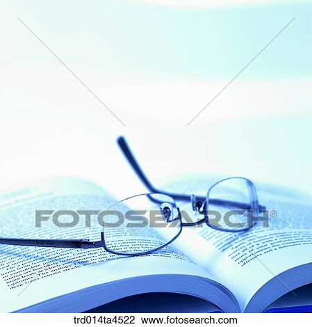 Glasses on the book View Large Photo Image Stock Image - Glasses on the book. Fotosearch