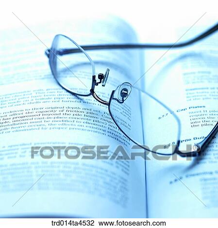 Glasses on the book View Large Photo Image Stock Image - Glasses on the book. Fotosearch