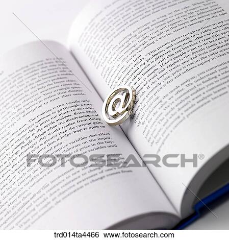 "@" sign on the book in English View Large Photo Image Stock Photograph - "@" sign on the book in English. Fotosearch