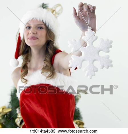 A woman wearing Santa Claus' clothes View Large Photo Image Stock Image - A woman wearing Santa Claus' clothes. Fotosearch