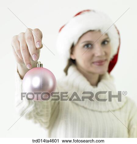 A woman wearing Santa Claus' clothes View Large Photo Image Stock Image - A woman wearing Santa Claus' clothes. Fotosearch