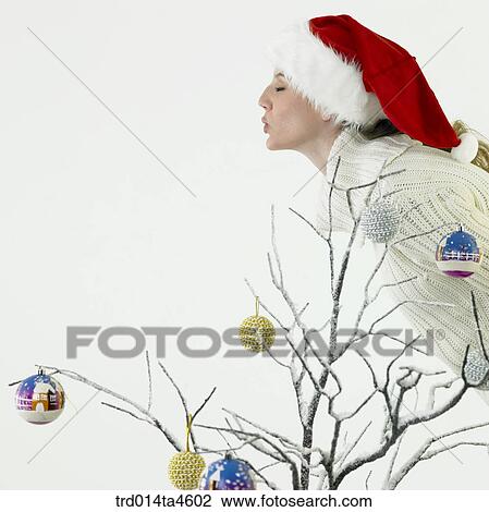 A woman wearing Santa Claus' clothes View Large Photo Image Stock Image - A woman wearing Santa Claus' clothes. Fotosearch
