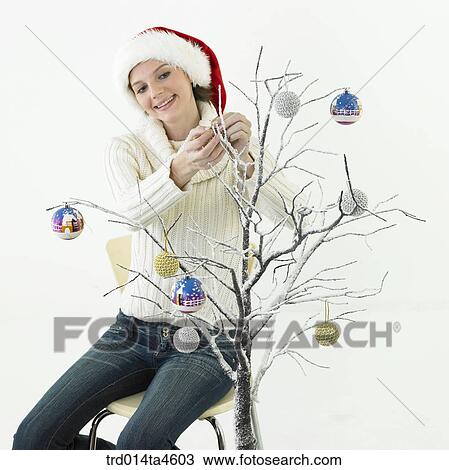 A woman wearing Santa Claus' clothes View Large Photo Image Stock Image - A woman wearing Santa Claus' clothes. Fotosearch