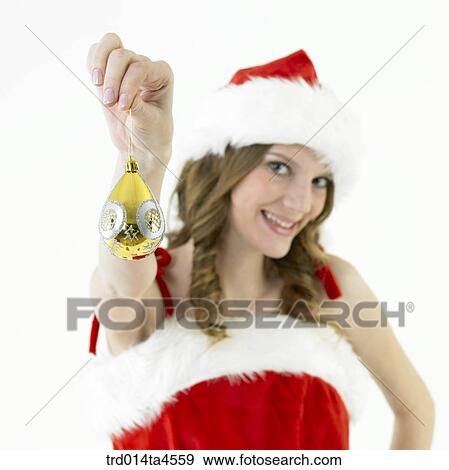 Christmas decoration and a woman wearing Santa Claus' clothes View Large Photo Image Stock Photo - Christmas decoration and a woman wearing Santa Claus' clothes. Fotosearch