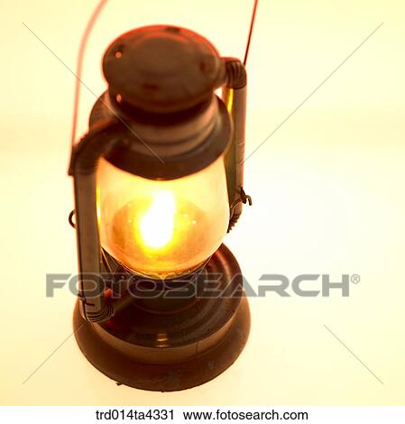 Stock Image - base of a kerosene lamp, antique, lifestyle object, lamplight, lamp, one, closeup. Fotosearch