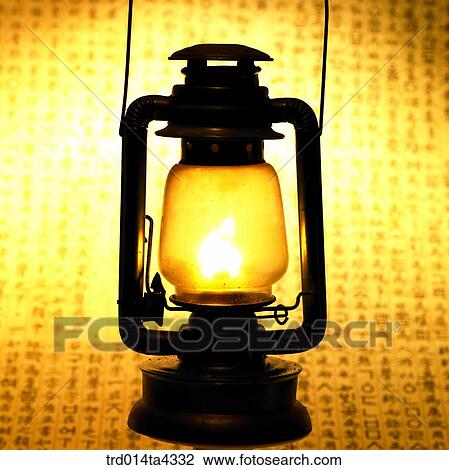 Stock Image - base of a kerosene lamp, antique, lifestyle object, lamplight, lamp, one, closeup. Fotosearch