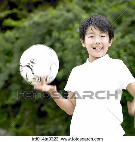 Boy having soccer ball View Large Photo Image Stock Image - Boy having soccer ball. Fotosearch