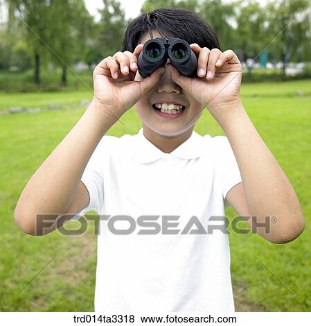 Boy looking out with telescope View Large Photo Image Stock Photo - Boy looking out with telescope. Fotosearch
