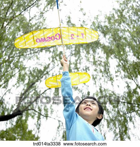 boy playng with model plane View Large Photo Image Stock Photo - boy playng with model plane. Fotosearch