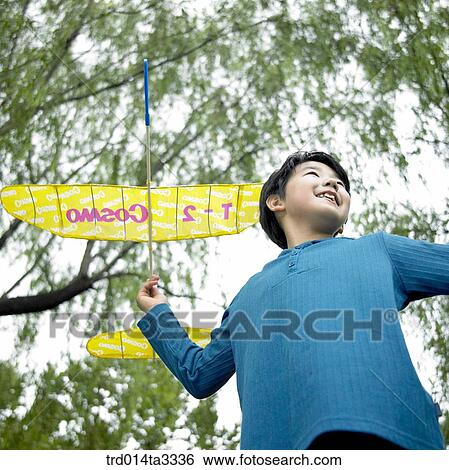 boy playng with model plane View Large Photo Image Stock Photograph - boy playng with model plane. Fotosearch