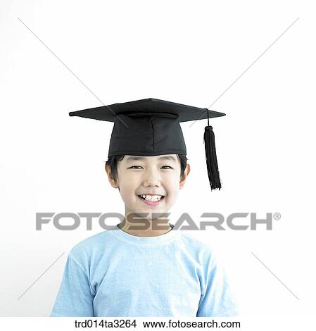 Boy wearing graduation cap View Large Photo Image Picture - Boy wearing graduation cap. Fotosearch