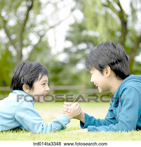 boys doing arm wresling View Large Photo Image Stock Photo - boys doing arm wresling. Fotosearch