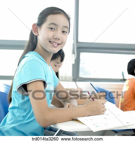 Child, Girl wearing graduation cap and hloing books View Large Photo Image Stock Image - Child, Girl wearing graduation cap and hloing books. Fotosearch