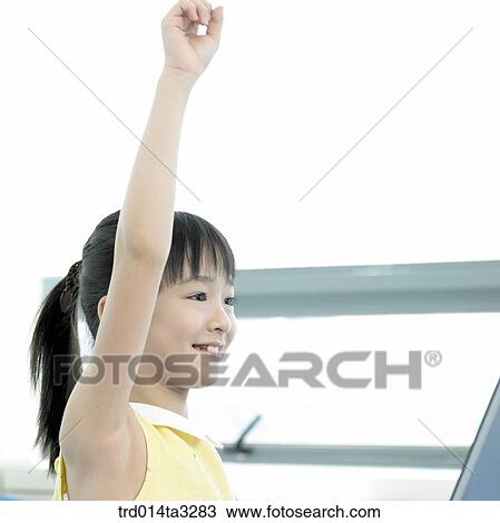 Girl raising her hands View Large Photo Image Stock Image - Girl raising her hands. Fotosearch