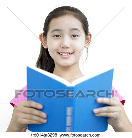 Stock Photo - Girl reading books. Fotosearch