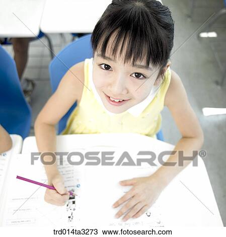 Girl taking notes View Large Photo Image Stock Image - Girl taking notes. Fotosearch
