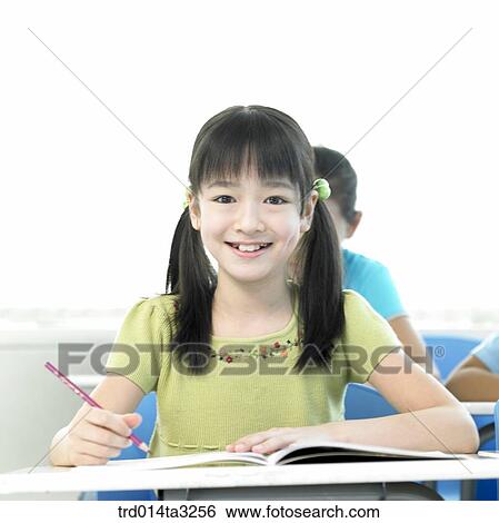 Girl taking notes View Large Photo Image Stock Photograph - Girl taking notes. Fotosearch