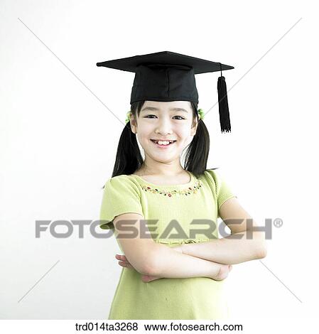 Girl wearing graduation cap and folding her arms View Large Photo Image Stock Photo - Girl wearing graduation cap and folding her arms. Fotosearch