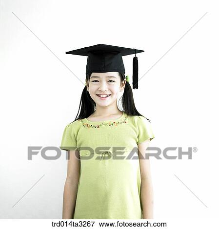 Girl wearing graduation cap View Large Photo Image Stock Photo - Girl wearing graduation cap. Fotosearch