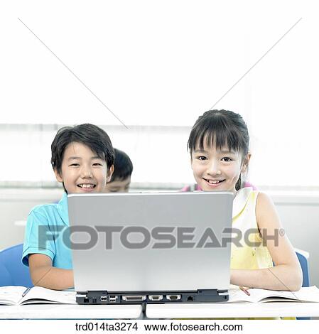 Picture - learign with notebook computer. Fotosearch